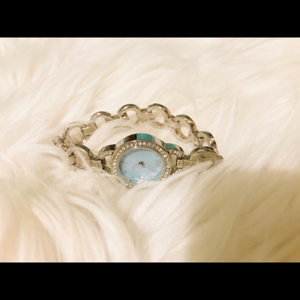 Silver and blue watch